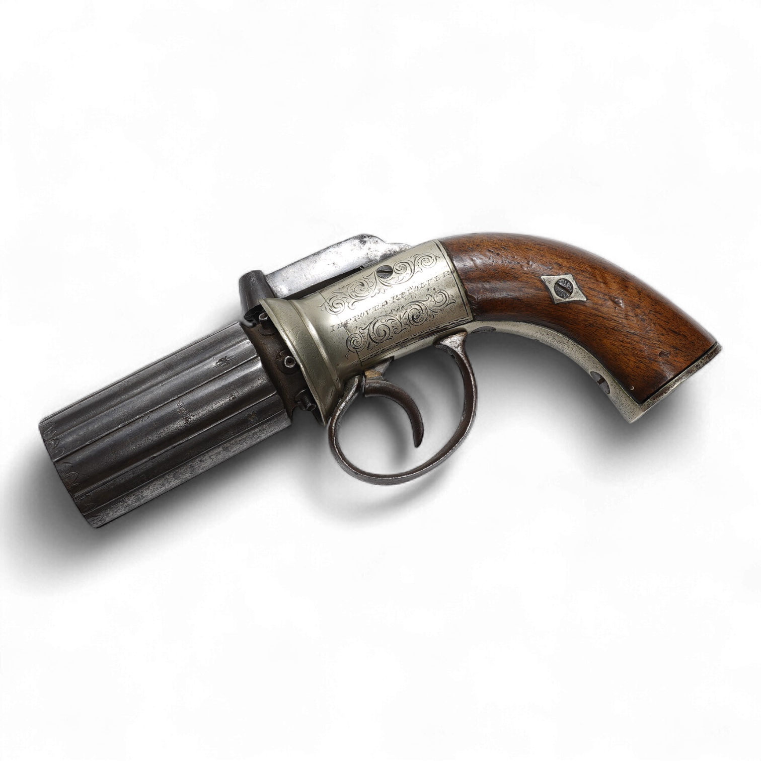 A six shot 120 bore self-cocking percussion pepperbox revolver with fluted barrels, Birmingham proof, rounded foliate engraved frame with ‘Improved Revolver’, and two-piece walnut grips